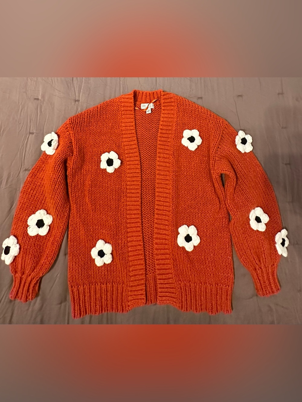 Cato Warm Orange Open-Front Cardigan with White Flower Accents